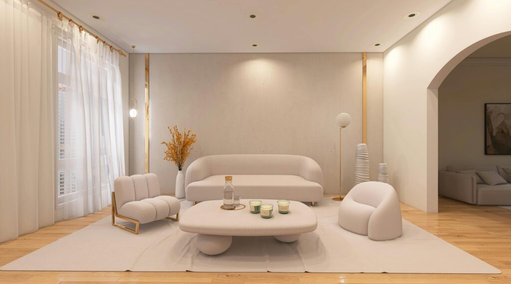 Stylish modern living room with soft beige furniture and elegant decor.